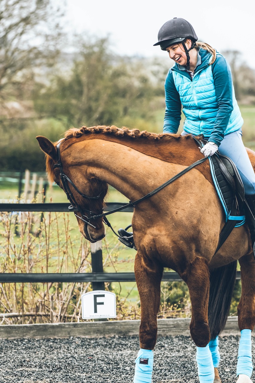 A lady riding a dressage horse after some dressage training